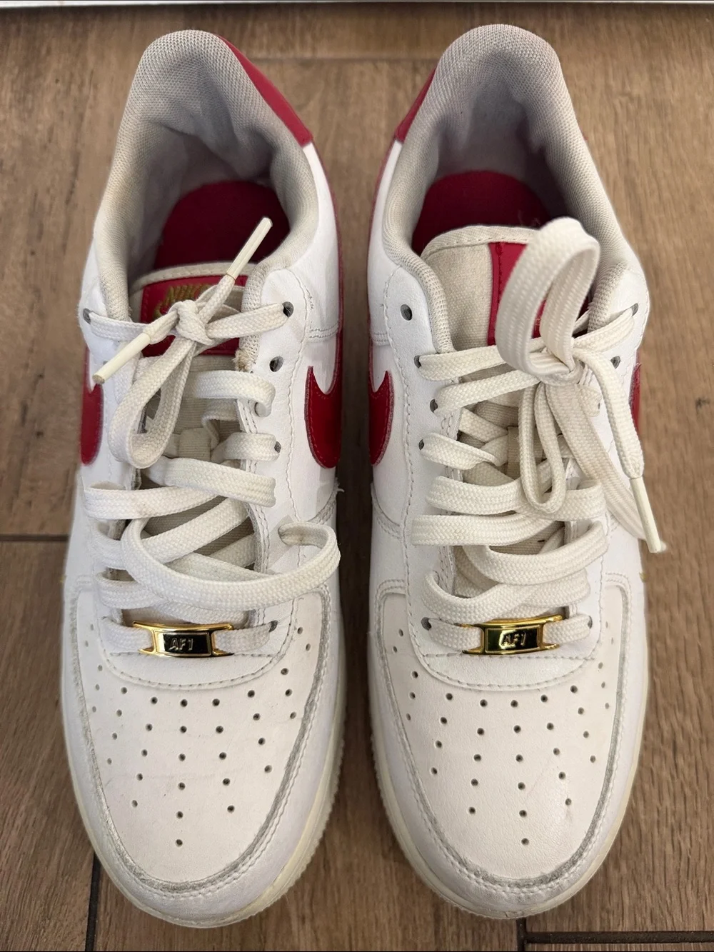 Nike Air Force 1 '07 ESS White Sneakers with Red Swoosh